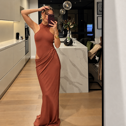 Caramel High Neck Sleeveless Maxi Dress with Side Waist Cutout, Draped Hip Detail, Fitted Bodice and Elegant Floor-Length Bodycon Silhouette