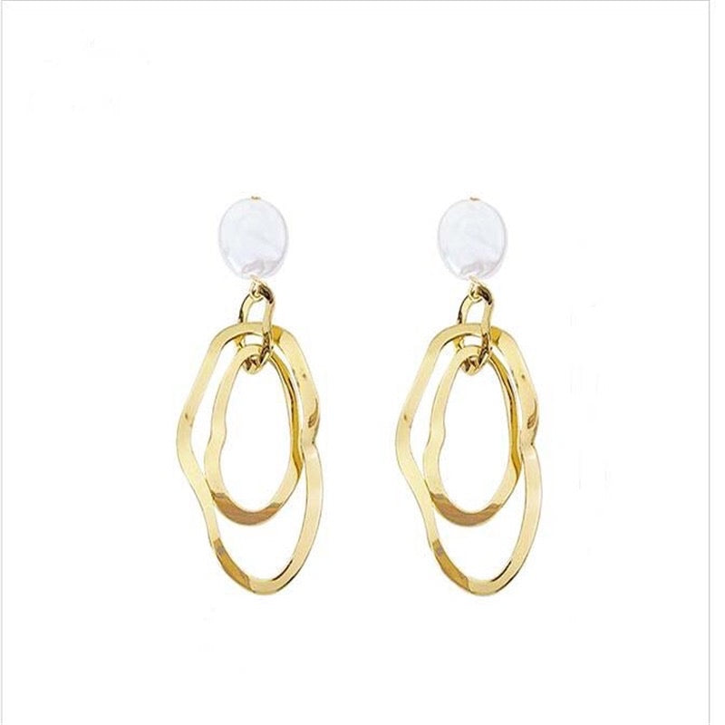 Golden earrings shiny earrings stylish look