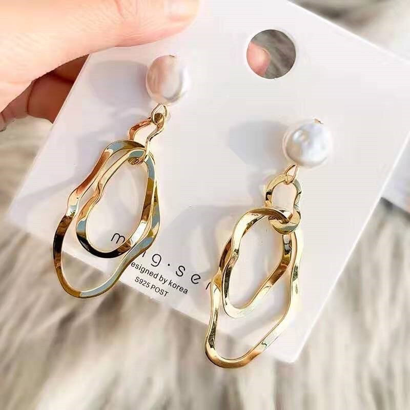 Golden earrings shiny earrings stylish look