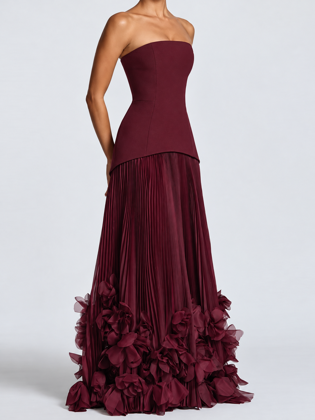 Women's Burgundy Strapless Evening Gown with Structured Corset-Inspired Bodice, Fitted Waist, Voluminous Pleated Tulle Maxi Skirt & Dramatic 3D Floral Appliqué Hemline