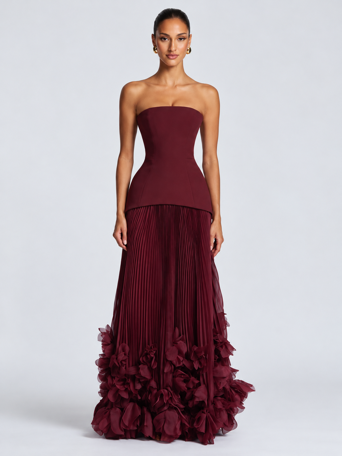 Women's Burgundy Strapless Evening Gown with Structured Corset-Inspired Bodice, Fitted Waist, Voluminous Pleated Tulle Maxi Skirt & Dramatic 3D Floral Appliqué Hemline
