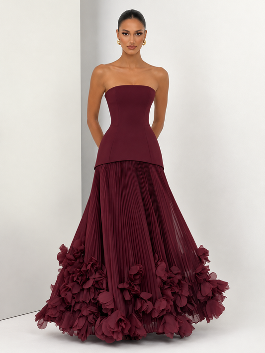 Women's Burgundy Strapless Evening Gown with Structured Corset-Inspired Bodice, Fitted Waist, Voluminous Pleated Tulle Maxi Skirt & Dramatic 3D Floral Appliqué Hemline