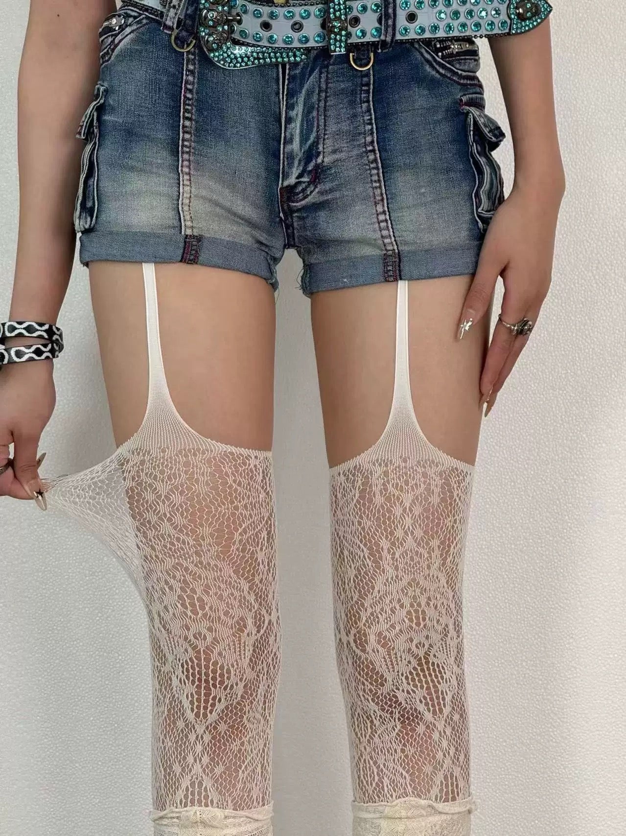 Women's fishnet stockings, black fishnet stockings, sexy stockings with provocative cuts for women, trendy and modern.