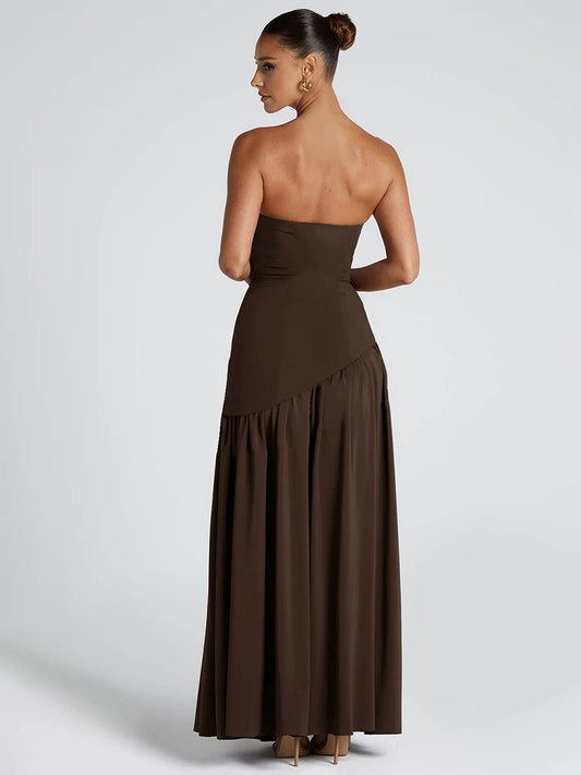 Elegant long Brown ribbon dress for women, strapless, featuring a corset-style upper part, high waist, and pleated design. Perfect for Summer 2026, ideal for evening parties and as a wedding guest outfit.
