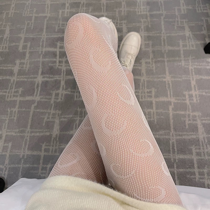 Black mesh socks adorned with moons, high-waisted, fashion socks, leggings, sheers for women.