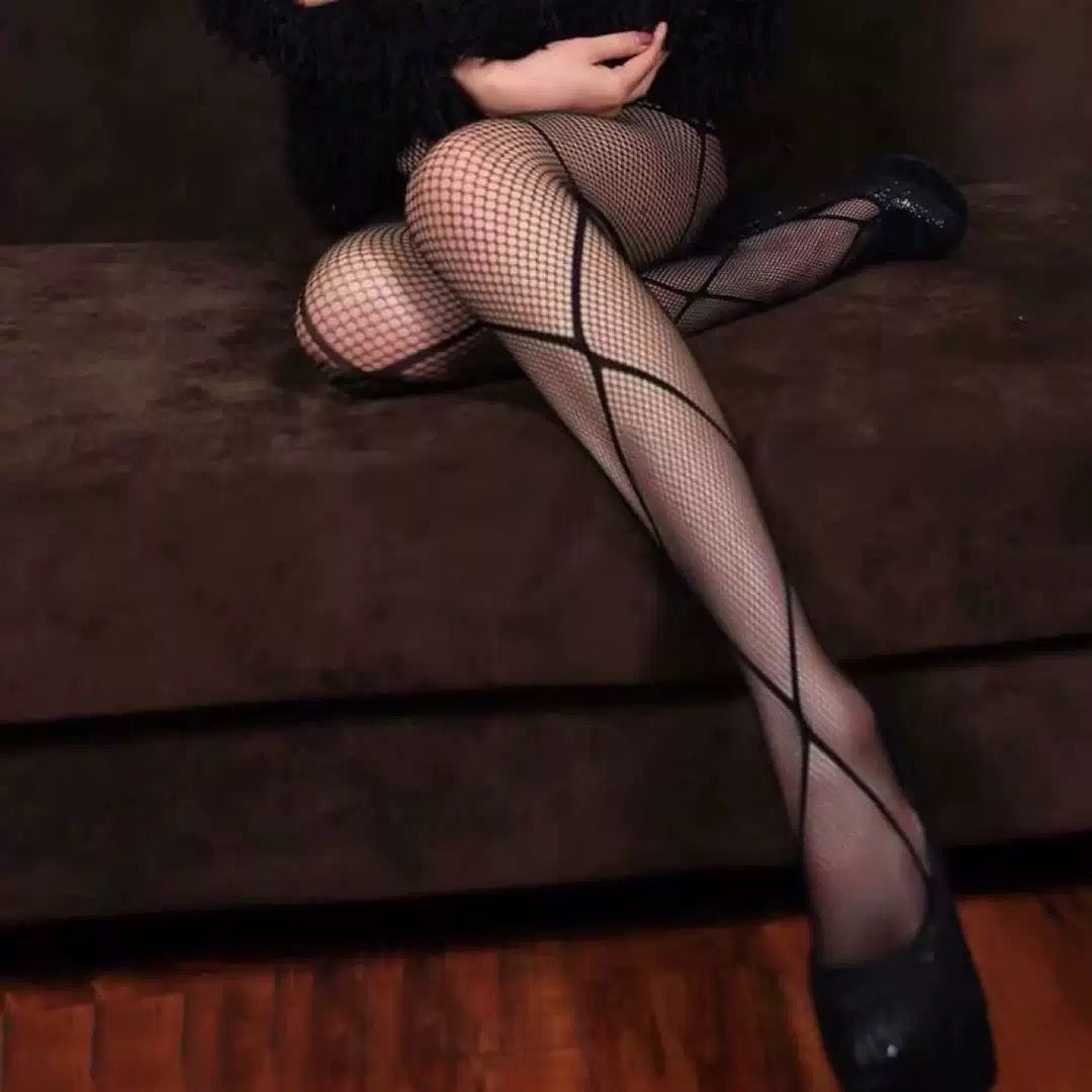 The thin black fishnet stockings with medium-sized mesh for women are alluring.