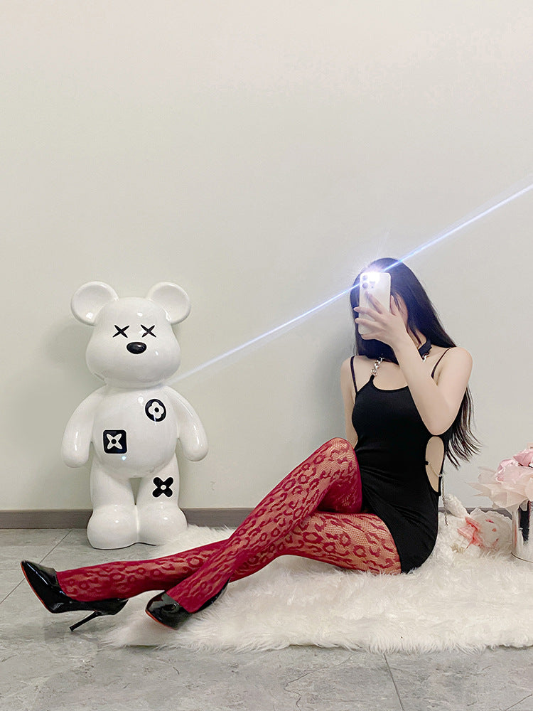 Fishnet pattern leopard print socks with a high waist are exciting.